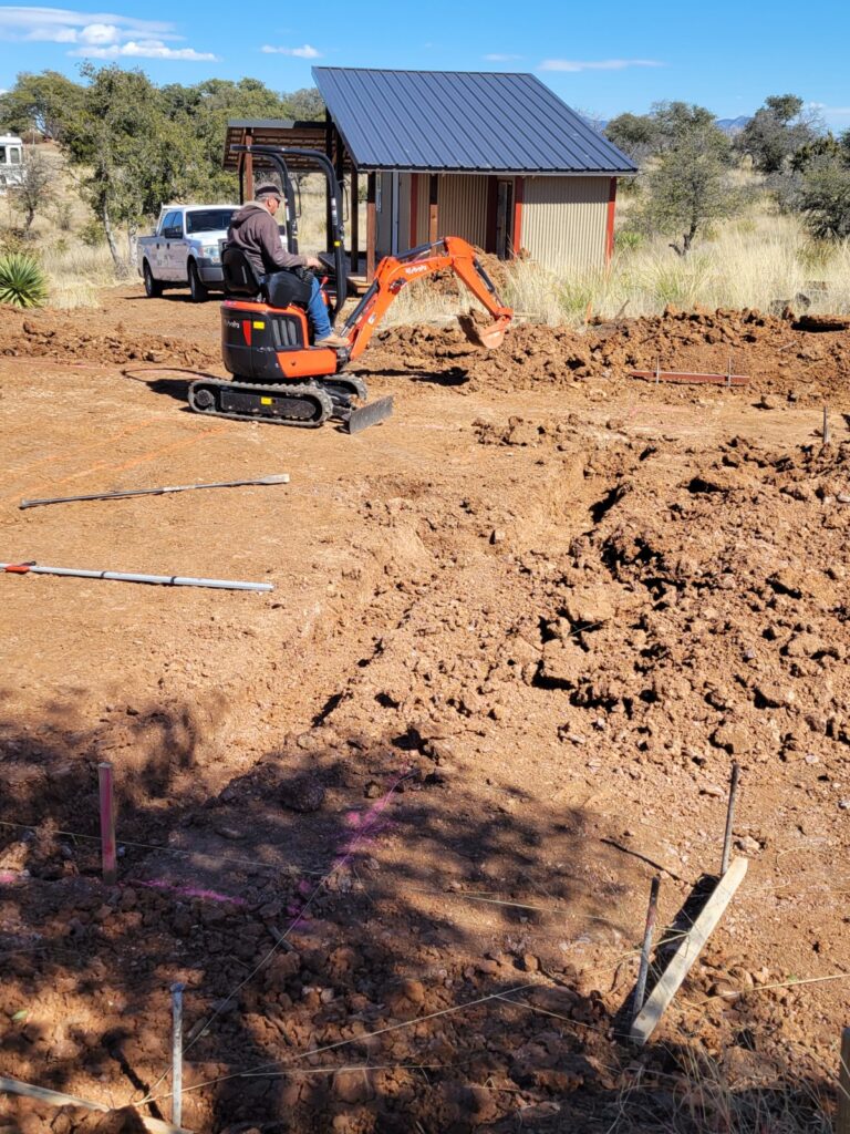 mini excavator digging footings